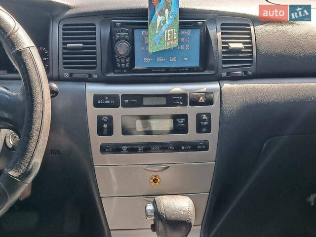 Серый Тойота Королла, объемом двигателя 1.6 л и пробегом 154 тыс. км за 4240 $, фото 12 на Automoto.ua