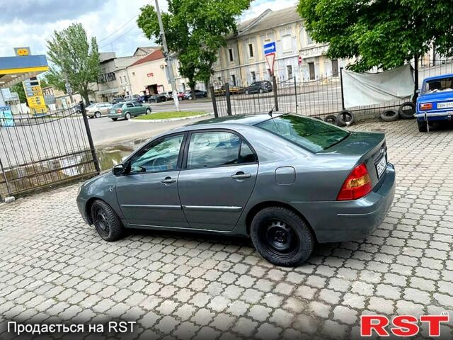 Сірий Тойота Королла, об'ємом двигуна 1.4 л та пробігом 256 тис. км за 3700 $, фото 1 на Automoto.ua