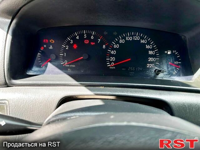 Сірий Тойота Королла, об'ємом двигуна 1.4 л та пробігом 256 тис. км за 3700 $, фото 5 на Automoto.ua