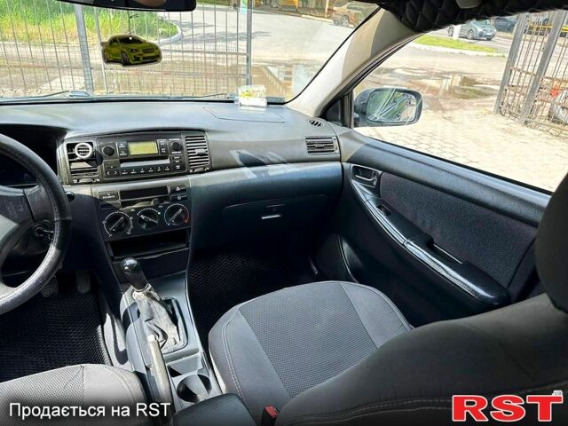 Сірий Тойота Королла, об'ємом двигуна 1.4 л та пробігом 256 тис. км за 3700 $, фото 4 на Automoto.ua