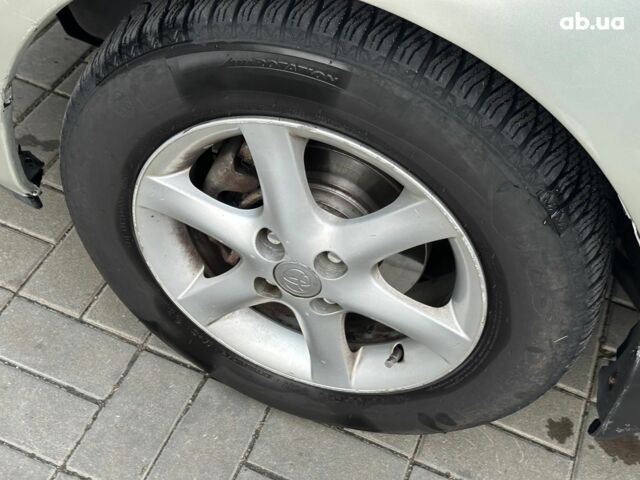 Сірий Тойота Королла, об'ємом двигуна 1.6 л та пробігом 245 тис. км за 5490 $, фото 6 на Automoto.ua