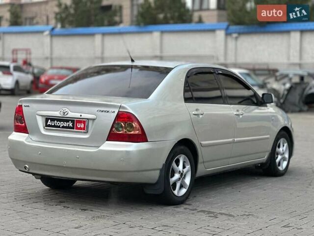 Сірий Тойота Королла, об'ємом двигуна 1.6 л та пробігом 245 тис. км за 5490 $, фото 3 на Automoto.ua