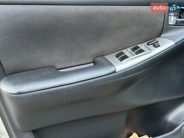 Сірий Тойота Королла, об'ємом двигуна 1.6 л та пробігом 245 тис. км за 5490 $, фото 10 на Automoto.ua
