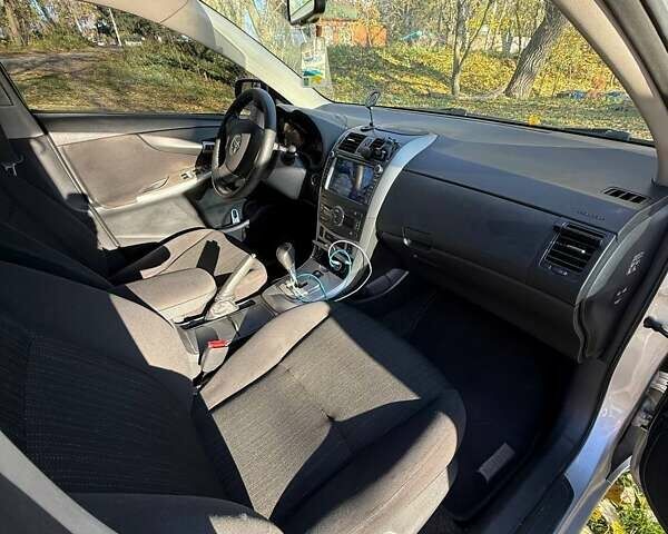 Сірий Тойота Королла, об'ємом двигуна 1.59 л та пробігом 250 тис. км за 6900 $, фото 7 на Automoto.ua