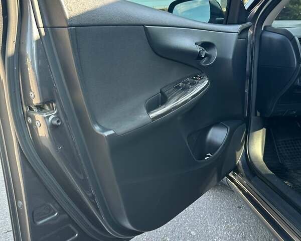 Серый Тойота Королла, объемом двигателя 1.6 л и пробегом 166 тыс. км за 6700 $, фото 36 на Automoto.ua