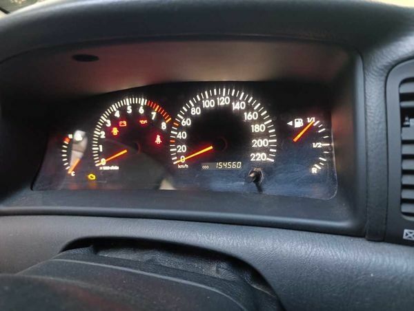 Серый Тойота Королла, объемом двигателя 1.6 л и пробегом 153 тыс. км за 7400 $, фото 5 на Automoto.ua