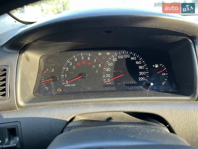 Серый Тойота Королла, объемом двигателя 1.6 л и пробегом 311 тыс. км за 5600 $, фото 4 на Automoto.ua