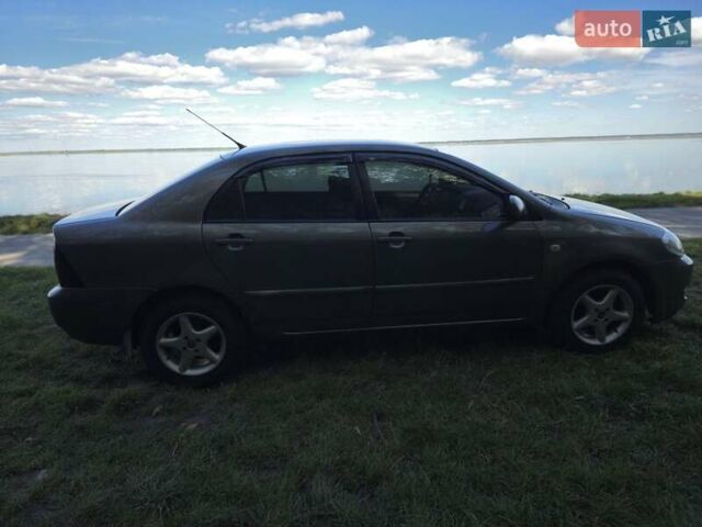 Сірий Тойота Королла, об'ємом двигуна 1.6 л та пробігом 320 тис. км за 6600 $, фото 2 на Automoto.ua