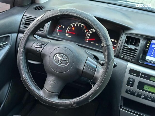 Сірий Тойота Королла, об'ємом двигуна 1.6 л та пробігом 245 тис. км за 5490 $, фото 17 на Automoto.ua