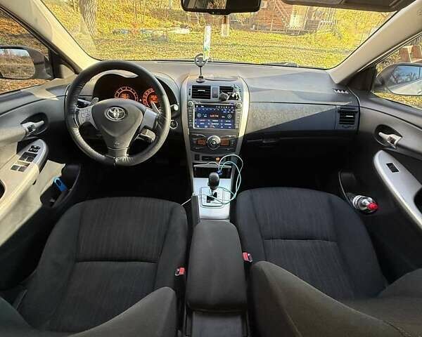 Сірий Тойота Королла, об'ємом двигуна 1.59 л та пробігом 250 тис. км за 6900 $, фото 10 на Automoto.ua