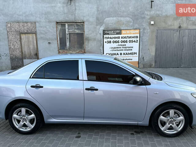 Сірий Тойота Королла, об'ємом двигуна 1.6 л та пробігом 247 тис. км за 7350 $, фото 4 на Automoto.ua