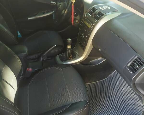 Сірий Тойота Королла, об'ємом двигуна 1.6 л та пробігом 171 тис. км за 7700 $, фото 21 на Automoto.ua