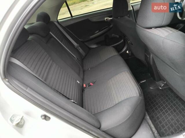 Серый Тойота Королла, объемом двигателя 1.6 л и пробегом 193 тыс. км за 7700 $, фото 21 на Automoto.ua