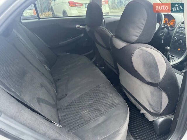 Серый Тойота Королла, объемом двигателя 1.6 л и пробегом 162 тыс. км за 7300 $, фото 11 на Automoto.ua