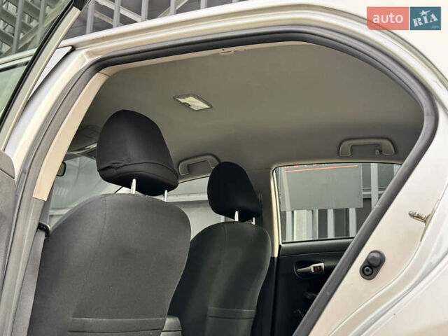 Серый Тойота Королла, объемом двигателя 1.6 л и пробегом 160 тыс. км за 7495 $, фото 14 на Automoto.ua