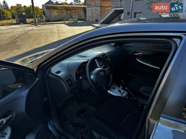 Сірий Тойота Королла, об'ємом двигуна 1.6 л та пробігом 257 тис. км за 5850 $, фото 7 на Automoto.ua