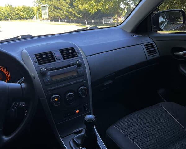 Серый Тойота Королла, объемом двигателя 1.6 л и пробегом 218 тыс. км за 6950 $, фото 21 на Automoto.ua