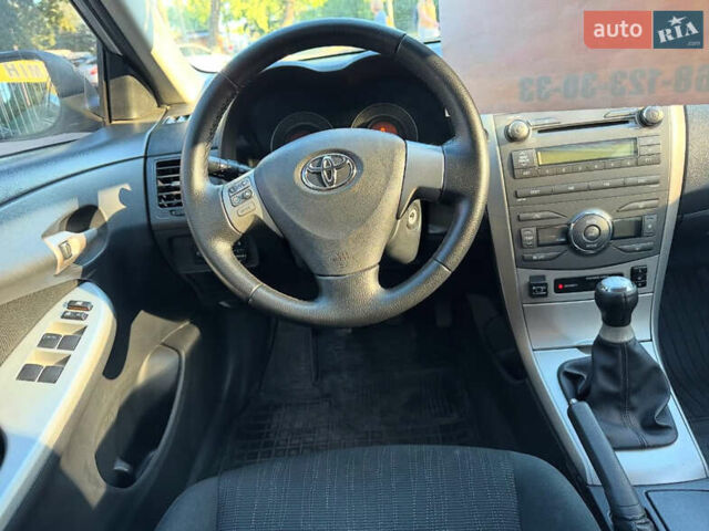 Серый Тойота Королла, объемом двигателя 1.6 л и пробегом 169 тыс. км за 6999 $, фото 9 на Automoto.ua