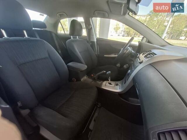 Сірий Тойота Королла, об'ємом двигуна 1.6 л та пробігом 175 тис. км за 8300 $, фото 21 на Automoto.ua