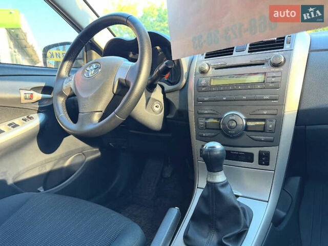 Серый Тойота Королла, объемом двигателя 1.6 л и пробегом 169 тыс. км за 6999 $, фото 8 на Automoto.ua
