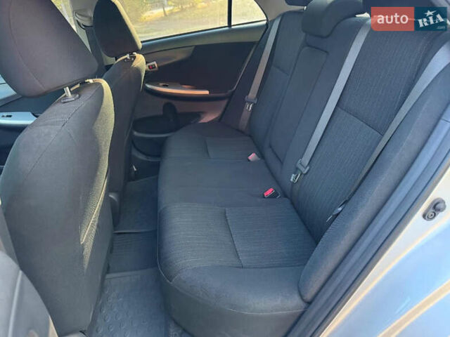 Серый Тойота Королла, объемом двигателя 1.6 л и пробегом 169 тыс. км за 6999 $, фото 5 на Automoto.ua