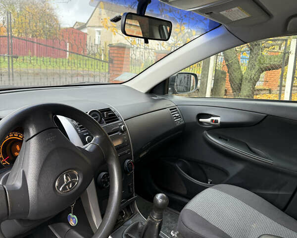 Сірий Тойота Королла, об'ємом двигуна 0.2 л та пробігом 176 тис. км за 7500 $, фото 7 на Automoto.ua