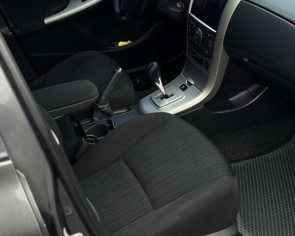 Серый Тойота Королла, объемом двигателя 1.6 л и пробегом 235 тыс. км за 4999 $, фото 9 на Automoto.ua