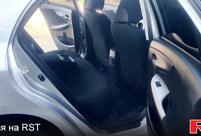 Сірий Тойота Королла, об'ємом двигуна 1.6 л та пробігом 285 тис. км за 5999 $, фото 6 на Automoto.ua