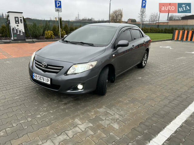 Сірий Тойота Королла, об'ємом двигуна 1.6 л та пробігом 213 тис. км за 7699 $, фото 1 на Automoto.ua