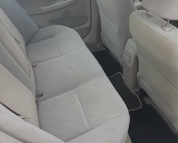 Серый Тойота Королла, объемом двигателя 1.79 л и пробегом 177 тыс. км за 7500 $, фото 5 на Automoto.ua