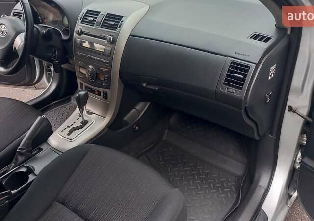 Серый Тойота Королла, объемом двигателя 1.6 л и пробегом 145 тыс. км за 8500 $, фото 21 на Automoto.ua