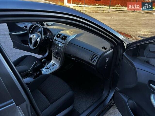 Сірий Тойота Королла, об'ємом двигуна 1.6 л та пробігом 257 тис. км за 5850 $, фото 13 на Automoto.ua