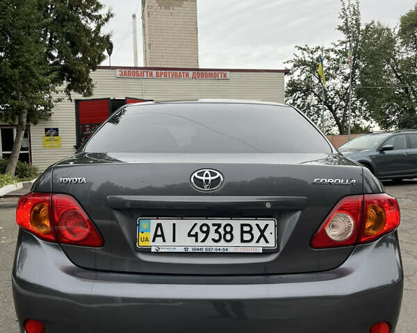 Сірий Тойота Королла, об'ємом двигуна 1.6 л та пробігом 183 тис. км за 6799 $, фото 7 на Automoto.ua