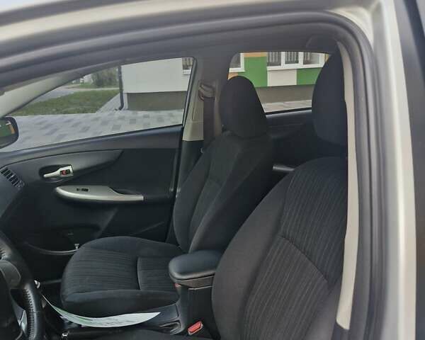 Сірий Тойота Королла, об'ємом двигуна 1.6 л та пробігом 170 тис. км за 7299 $, фото 22 на Automoto.ua