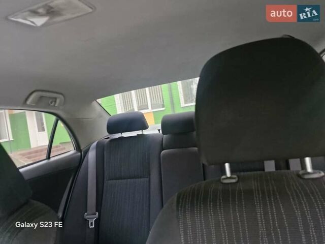 Сірий Тойота Королла, об'ємом двигуна 1.6 л та пробігом 170 тис. км за 7299 $, фото 23 на Automoto.ua