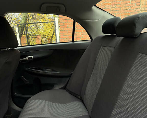 Сірий Тойота Королла, об'ємом двигуна 0.2 л та пробігом 176 тис. км за 7500 $, фото 5 на Automoto.ua