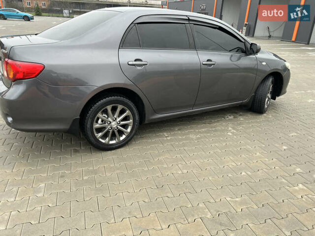 Сірий Тойота Королла, об'ємом двигуна 1.6 л та пробігом 213 тис. км за 7699 $, фото 4 на Automoto.ua