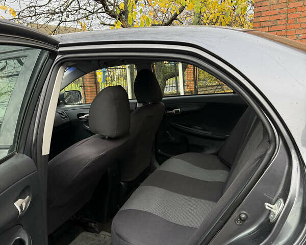 Сірий Тойота Королла, об'ємом двигуна 0.2 л та пробігом 176 тис. км за 7500 $, фото 4 на Automoto.ua