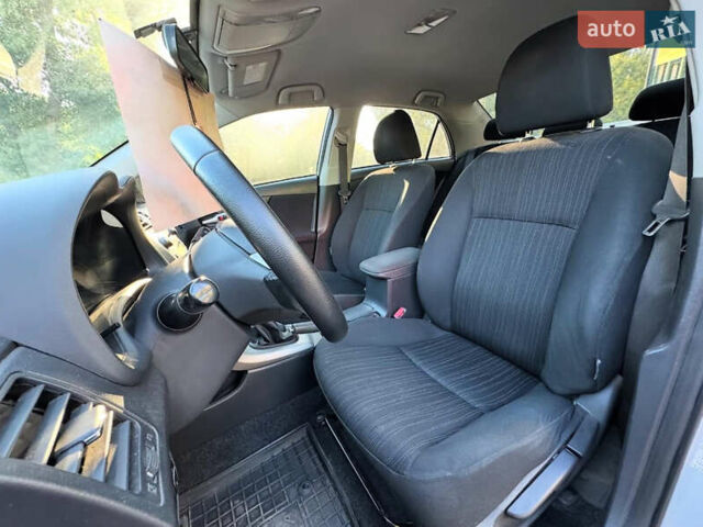 Серый Тойота Королла, объемом двигателя 1.6 л и пробегом 169 тыс. км за 6999 $, фото 4 на Automoto.ua