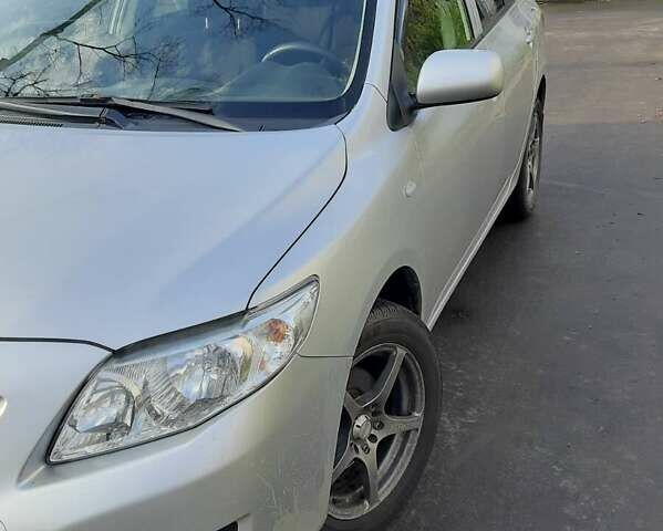 Серый Тойота Королла, объемом двигателя 1.6 л и пробегом 128 тыс. км за 7800 $, фото 1 на Automoto.ua