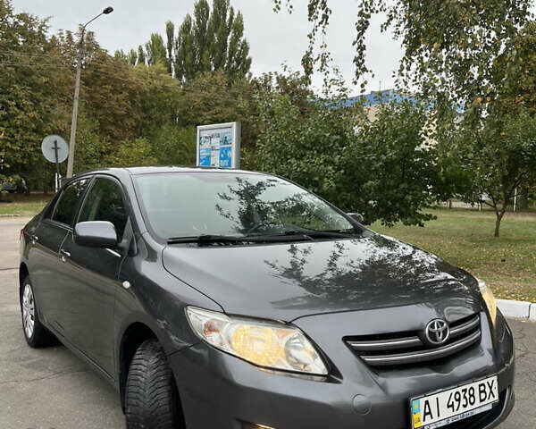 Сірий Тойота Королла, об'ємом двигуна 1.6 л та пробігом 183 тис. км за 6799 $, фото 1 на Automoto.ua