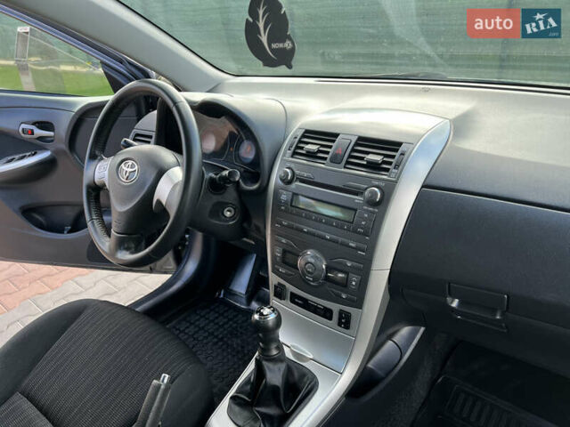 Сірий Тойота Королла, об'ємом двигуна 1.6 л та пробігом 213 тис. км за 7699 $, фото 21 на Automoto.ua