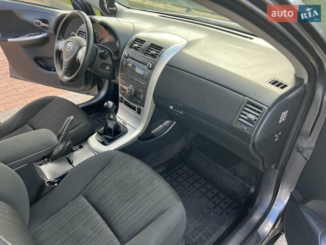 Сірий Тойота Королла, об'ємом двигуна 1.6 л та пробігом 213 тис. км за 7699 $, фото 28 на Automoto.ua