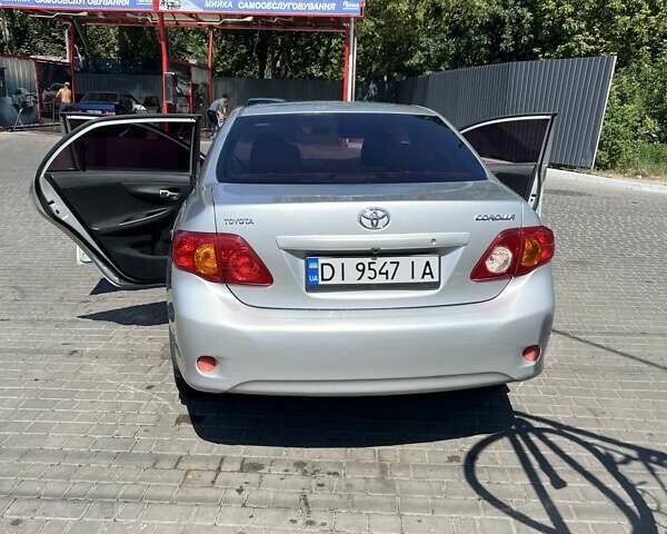 Серый Тойота Королла, объемом двигателя 1.6 л и пробегом 253 тыс. км за 7000 $, фото 1 на Automoto.ua