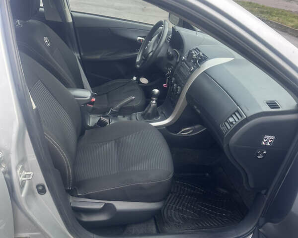 Серый Тойота Королла, объемом двигателя 1.33 л и пробегом 178 тыс. км за 7200 $, фото 12 на Automoto.ua