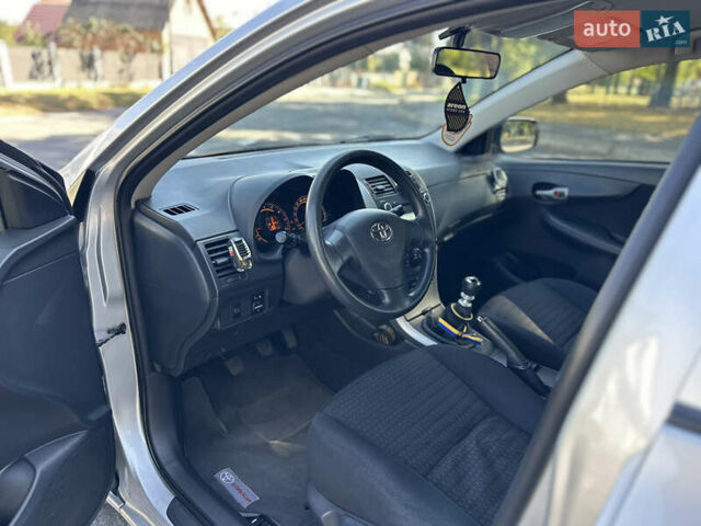 Серый Тойота Королла, объемом двигателя 1.4 л и пробегом 237 тыс. км за 6999 $, фото 37 на Automoto.ua