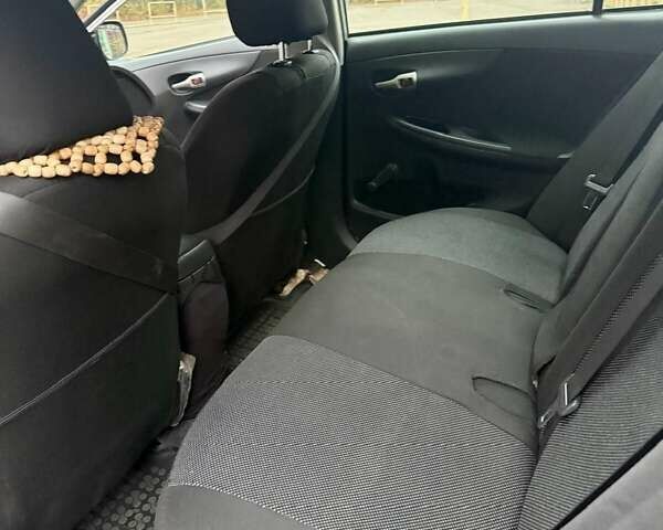 Сірий Тойота Королла, об'ємом двигуна 1.33 л та пробігом 247 тис. км за 7100 $, фото 3 на Automoto.ua