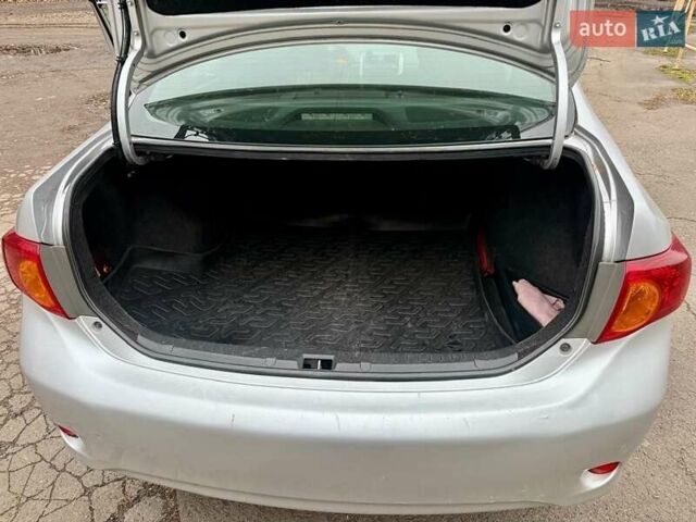 Сірий Тойота Королла, об'ємом двигуна 1.33 л та пробігом 247 тис. км за 7100 $, фото 4 на Automoto.ua