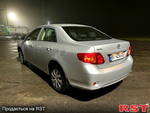 Серый Тойота Королла, объемом двигателя 1.3 л и пробегом 124 тыс. км за 6700 $, фото 2 на Automoto.ua