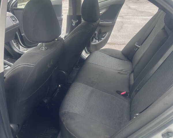 Серый Тойота Королла, объемом двигателя 1.33 л и пробегом 178 тыс. км за 7200 $, фото 8 на Automoto.ua